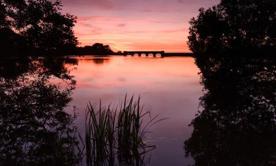 GSY 017 - St Saviours reservoir, Guersney - pink and red sunset - lake